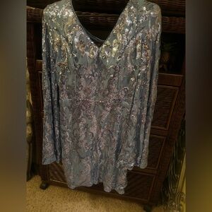 Stunning light blue bling dress. Crisscross back. 
Flare sleeve beautiful dress